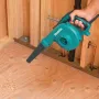 Sopladora de Aire 600 W.  0 - 16.000 rpm. Soplador de hojas - en uso