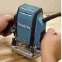 Rebajadora Makita RP0900X3 900W 8 mm Fresadora para madera